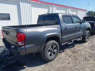 2017 Toyota Tacoma SR5 with VIN 5TFAZ5CN7HX033594, listed as a IAAI auction lot 41881117 with 86,676 mi miles and . Bid and sale history available at DreamBid. Image 4.