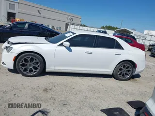 2015 Chrysler 300 with VIN 2C3CCABG9FH736013, listed as a IAAI auction lot 41646979 with 103,572 mi miles. Bid and sale history available at carsss.com. Image 14.