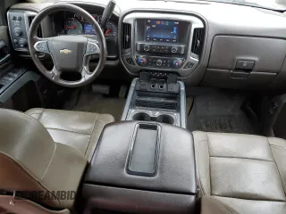 2014 Chevrolet Silverado 1500 LTZ with VIN 1GCVKSEC0EZ140325, listed as a Copart auction lot 52954845 with 128,231 mi miles and Salvage Title. Bid and sale history available at DreamBid. Image 8.