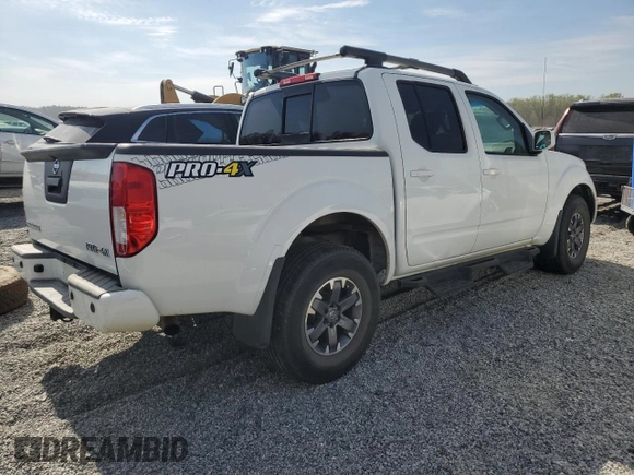 2015 Nissan Frontier Pro-4X with VIN 1N6AD0EV5FN700571, listed as a Copart auction lot 50974615 with 138,930 mi miles and Salvage title. Bid and sale history available at DreamBid. Image 3.