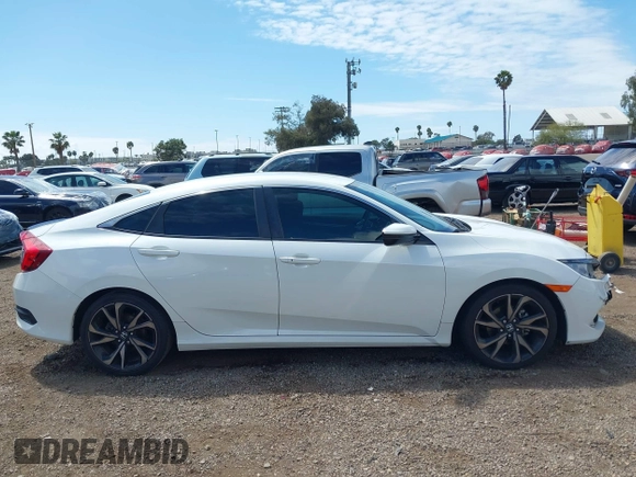 2019 Honda Civic Sport with VIN 2HGFC2F85KH600037, listed as a IAAI auction lot 42030526 with 82,821 mi miles and . Bid and sale history available at DreamBid. Image 13.