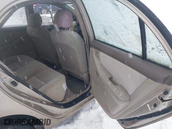 2004 Toyota Corolla CE with VIN 1NXBR32E24Z202972, listed as a IAAI auction lot 41210085 with 210,250 mi miles and . Bid and sale history available at DreamBid. Image 8.