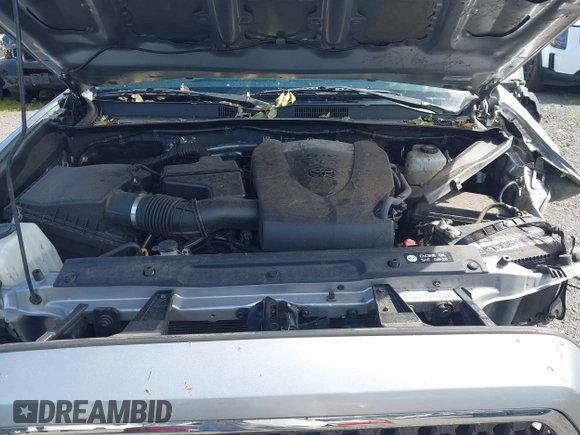 2018 Toyota Tacoma SR z VIN 3TMCZ5AN7JM156092, wystawiony jako IAAI lot #41642391 z przebiegiem 65 805 mil mil oraz . Historia ofert i sprzedaży dostępna na DreamBid. Obrazek 10.