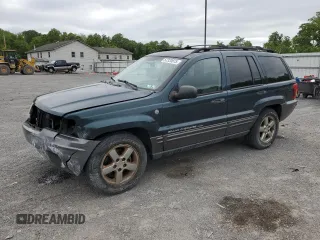 2004 Jeep Grand Cherokee Laredo z VIN 1J4GW48S04C418812, wystawiony jako Copart lot #57320875 z przebiegiem 132 854 mil mil oraz Szkody całkowita. Historia ofert i sprzedaży dostępna na DreamBid. Obrazek 1.