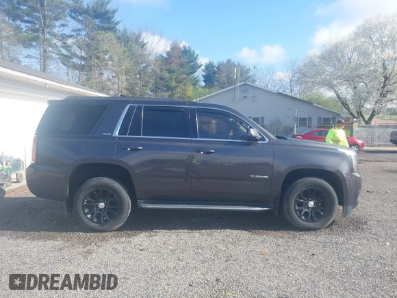 2016 GMC Yukon SLE with VIN 1GKS2AKC9GR273724, listed as a IAAI auction lot 41945761 with 141,425 mi miles. Bid and sale history available at carsss.com. Image 14.