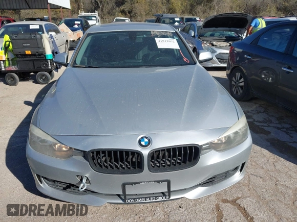 2012 BMW 3 Series 328i with VIN WBA3A5C5XCF345274, listed as a IAAI auction lot 41812072 with 142,024 mi miles. Bid and sale history available at carsss.com. Image 6.