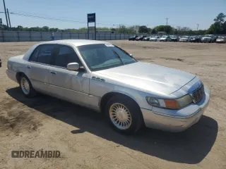 1999 Mercury Grand Marquis LS z VIN 2MEFM75W5XX673218, wystawiony jako Copart lot #52621285 z przebiegiem 163 642 mil mil oraz Szkoda całkowita • Salvage title. Historia ofert i sprzedaży dostępna na DreamBid. Obrazek 4.