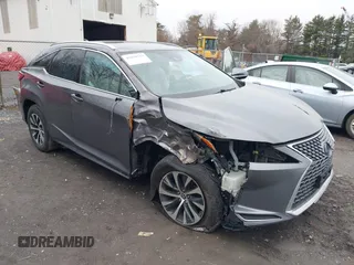 2021 Lexus RX with VIN 2T2HZMDA4MC259360, listed as a IAAI auction lot 41820519 with 57,747 mi miles. Bid and sale history available at carsss.com. Image 6.