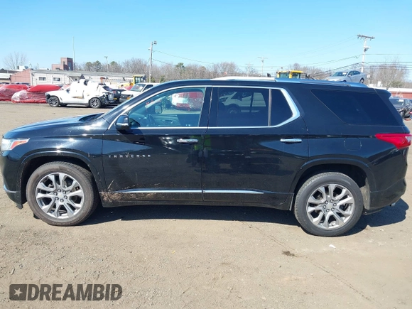 2018 Chevrolet Traverse Premier with VIN 1GNEVJKW8JJ159561, listed as a IAAI auction lot 41774914 with 132,598 mi miles and . Bid and sale history available at DreamBid. Image 14.