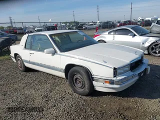 1989 Cadillac Eldorado with VIN 1G6EL1150KU621587, listed as a IAAI auction lot 42103841 with 129,711 mi miles and . Bid and sale history available at DreamBid. Image 1.