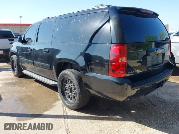 2014 Chevrolet Suburban LT with VIN 1GNSCJE03ER203943, listed as a IAAI auction lot 41982720 with 288,135 mi miles and . Bid and sale history available at DreamBid. Image 3.