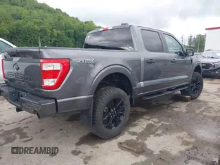 2023 Ford F-150 XL with VIN 1FTFW1E58PFA85521, listed as a IAAI auction lot 42334349 with 39,356 mi miles and . Bid and sale history available at DreamBid. Image 4.