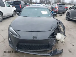 2016 Scion FR-S with VIN JF1ZNAA15G8708350, listed as a IAAI auction lot 41679656 with 111,245 mi miles. Bid and sale history available at carsss.com. Image 13.