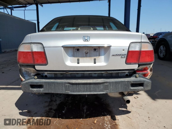 1997 Honda Accord LX with VIN 1HGCD5636VA103717, listed as a Copart auction lot 51918965 with 209,901 mi miles and Salvage title. Bid and sale history available at DreamBid. Image 6.