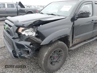 2014 Toyota Tacoma with VIN 3TMLU4EN4EM159363, listed as a IAAI auction lot 41337909 with 123,362 mi miles. Bid and sale history available at carsss.com. Image 6.