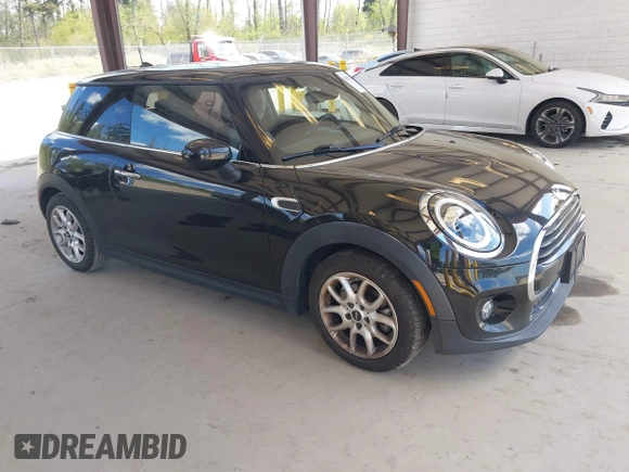 2021 MINI Hardtop Cooper with VIN WMWXR3C0XM2N93195, listed as a IAAI auction lot 42083421 with 46,269 mi miles and . Bid and sale history available at DreamBid. Image 1.