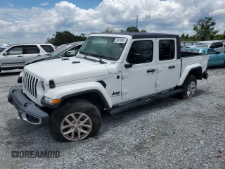 2023 Jeep Gladiator Freedom z VIN 1C6HJTAG6PL535119, wystawiony jako Copart lot #56870905 z przebiegiem 23 707 mil mil oraz Szkoda całkowita • Salvage title. Historia ofert i sprzedaży dostępna na DreamBid. Obrazek 1.