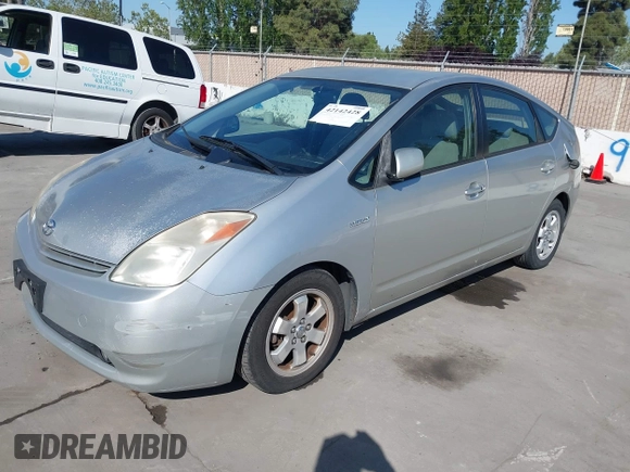 2005 Toyota Prius with VIN JTDKB20U253040216, listed as a IAAI auction lot 42142428 with 292,772 mi miles. Bid and sale history available at carsss.com. Image 2.
