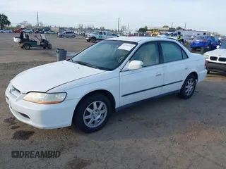 1999 Honda Accord LX with VIN JHMCG665XXC014090, listed as a IAAI auction lot 41765749 with 231,682 mi miles and . Bid and sale history available at DreamBid. Image 2.