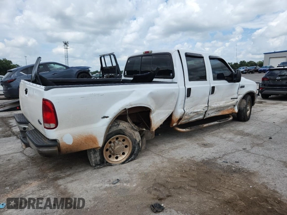 2002 Ford F-250 XL with VIN 1FTNW20F32EA27266, listed as a Copart auction lot 63110855 with 265,546 mi miles and Salvage title. Bid and sale history available at DreamBid. Image 3.