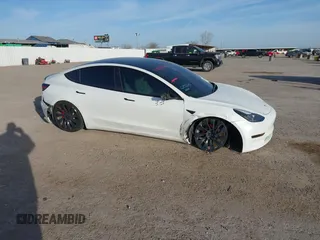 2023 Tesla Model 3 Performance z VIN 5YJ3E1EC5PF689620, wystawiony jako IAAI lot #41814112 z przebiegiem Nie podano mil oraz . Historia ofert i sprzedaży dostępna na DreamBid. Obrazek 13.