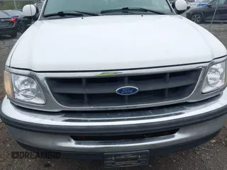 2003 Ford F-150 XLT with VIN 1FTRW08L43KA64328, listed as a IAAI auction lot 41932751 with 275,213 mi miles. Bid and sale history available at carsss.com. Image 6.