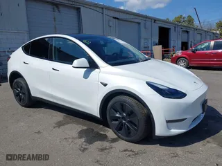 2025 Tesla Model Y Long Range with VIN 7SAYGDEE2SA354505, listed as a IAAI auction lot 41869914 with 1,949 mi miles. Bid and sale history available at carsss.com. Image 1.