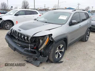 2016 Jeep Cherokee Trailhawk with VIN 1C4PJMBS7GW192574, listed as a IAAI auction lot 41986638 with 144,970 mi miles and . Bid and sale history available at DreamBid. Image 22.