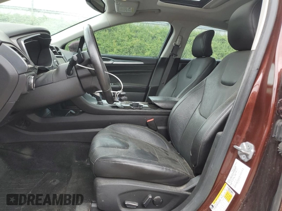 2016 Ford Fusion Titanium with VIN 3FA6P0D95GR141645, listed as a Copart auction lot 62582215 with 216,674 mi miles and Clean title. Bid and sale history available at DreamBid. Image 7.