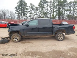 2023 Toyota Tacoma 4WD SR with VIN 3TYCZ5AN8PT132624, listed as a IAAI auction lot 41236047 with 47,273 mi miles. Bid and sale history available at carsss.com. Image 15.