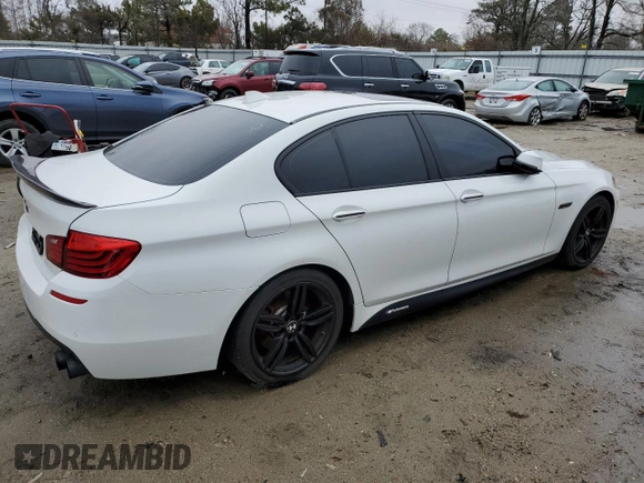 2015 BMW 5 Series 550i with VIN WBAKN9C56FD682337, listed as a Copart auction lot 44209865 with 115,956 mi miles and Clean title. Bid and sale history available at DreamBid. Image 3.