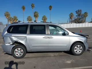2009 Kia Sedona LX with VIN KNDMB233696303422, listed as a IAAI auction lot 41685934 with 148,746 mi miles. Bid and sale history available at carsss.com. Image 14.