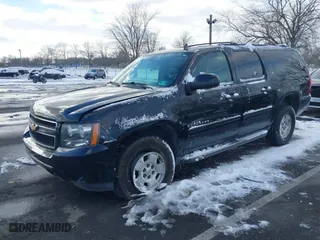 2014 Chevrolet Suburban LT with VIN 1GNSKJE79ER112014, listed as a IAAI auction lot 41384706 with 257,484 mi miles. Bid and sale history available at carsss.com. Image 18.