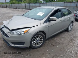 2016 Ford Focus SE z VIN 1FADP3F26GL368544, wystawiony jako IAAI lot #42322376 z przebiegiem 120 535 mil mil oraz . Historia ofert i sprzedaży dostępna na DreamBid. Obrazek 2.