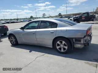 2014 Dodge Charger SE with VIN 2C3CDXBGXEH269070, listed as a Copart auction lot 52971125 with 224,940 mi miles and Salvage Title. Bid and sale history available at carsss.com. Image 2.