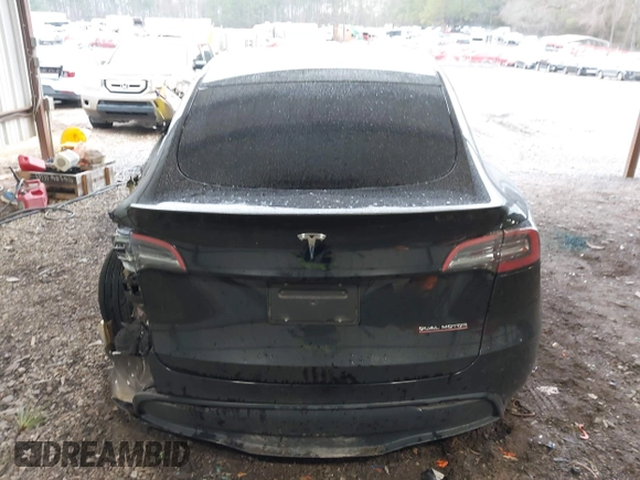 2023 Tesla Model Y Performance with VIN 7SAYGDEF2PF800641, listed as a IAAI auction lot 41612596 with 60,984 mi miles and . Bid and sale history available at DreamBid. Image 16.