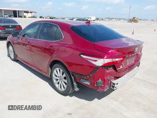 2020 Toyota Camry LE with VIN 4T1L11AK3LU993342, listed as a IAAI auction lot 42033420 with 84,849 mi miles and . Bid and sale history available at DreamBid. Image 3.