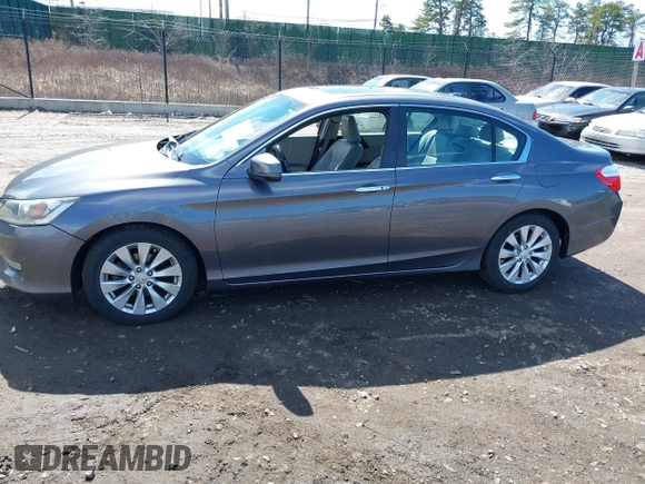 2013 Honda Accord EX-L with VIN 1HGCR2F85DA023495, listed as a IAAI auction lot 41831515 with 67,619 mi miles and . Bid and sale history available at DreamBid. Image 14.