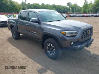 2021 Toyota Tacoma SR with VIN 3TMCZ5AN5MM450918, listed as a IAAI auction lot 42417102 with 34,777 mi miles and . Bid and sale history available at DreamBid. Image 1.