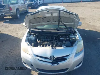 2007 Toyota Yaris with VIN JTDBT923871099599, listed as a IAAI auction lot 41751182 with 302,719 mi miles. Bid and sale history available at carsss.com. Image 10.