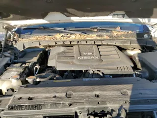 2018 Nissan Titan Pro-4X z VIN 1N6AA1E58JN520184, wystawiony jako Copart lot #88111315 z przebiegiem 93 326 mil mil oraz Szkoda całkowita • Salvage title. Historia ofert i sprzedaży dostępna na DreamBid. Obrazek 11.