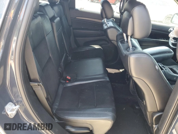 2018 Jeep Grand Cherokee Altitude with VIN 1C4RJFAGXJC267021, listed as a Copart auction lot 58762945 with 93,347 mi miles and Salvage title. Bid and sale history available at DreamBid. Image 11.