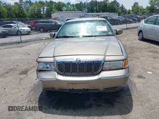 2001 Mercury Grand Marquis LS z VIN 2MEFM75W31X704182, wystawiony jako IAAI lot #42086175 z przebiegiem 177 892 mil mil oraz . Historia ofert i sprzedaży dostępna na DreamBid. Obrazek 12.