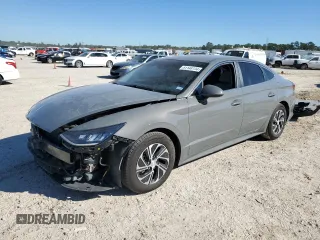 2022 Hyundai Sonata Hybrid Blue with VIN KMHL24JJ3NA041788, listed as a Copart auction lot 81148134 with 99,214 mi miles and Salvage Title. Bid and sale history available at carsss.com. Image 1.