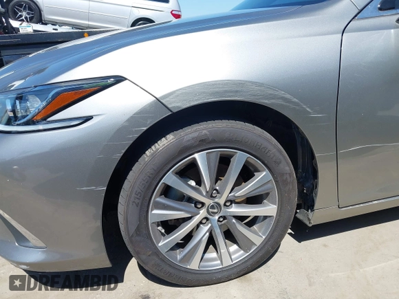 2021 Lexus ES 300h with VIN 58ACA1C1XMU007576, listed as a IAAI auction lot 42302934 with 24,614 mi miles and . Bid and sale history available at DreamBid. Image 6.