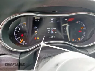 2021 Jeep Grand Cherokee Laredo X z VIN 1C4RJEAG2MC681229, wystawiony jako Copart lot #57771765 z przebiegiem 110 671 mil mil oraz Szkoda całkowita • Salvage title. Historia ofert i sprzedaży dostępna na DreamBid. Obrazek 9.