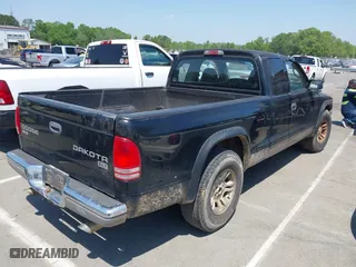 2004 Dodge Dakota SLT with VIN 1D7GL42N14S527342, listed as a IAAI auction lot 42081956 with 165,157 mi miles. Bid and sale history available at carsss.com. Image 4.