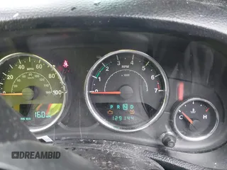 2014 Jeep Wrangler Unlimited Sport with VIN 1C4BJWDG1EL135073, listed as a IAAI auction lot 42435361 with 129,144 mi miles and . Bid and sale history available at DreamBid. Image 7.