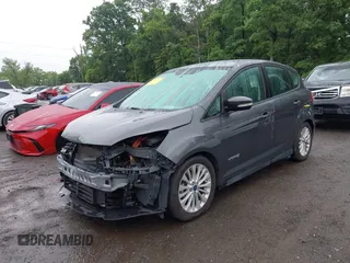 2018 Ford C-Max SE z VIN 1FADP5AU4JL100846, wystawiony jako IAAI lot #42307229 z przebiegiem 66 076 mil mil oraz . Historia ofert i sprzedaży dostępna na DreamBid. Obrazek 2.