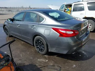 2016 Nissan Altima SV with VIN 1N4AL3AP5GC166005, listed as a IAAI auction lot 41795548 with 111,942 mi miles and . Bid and sale history available at DreamBid. Image 3.